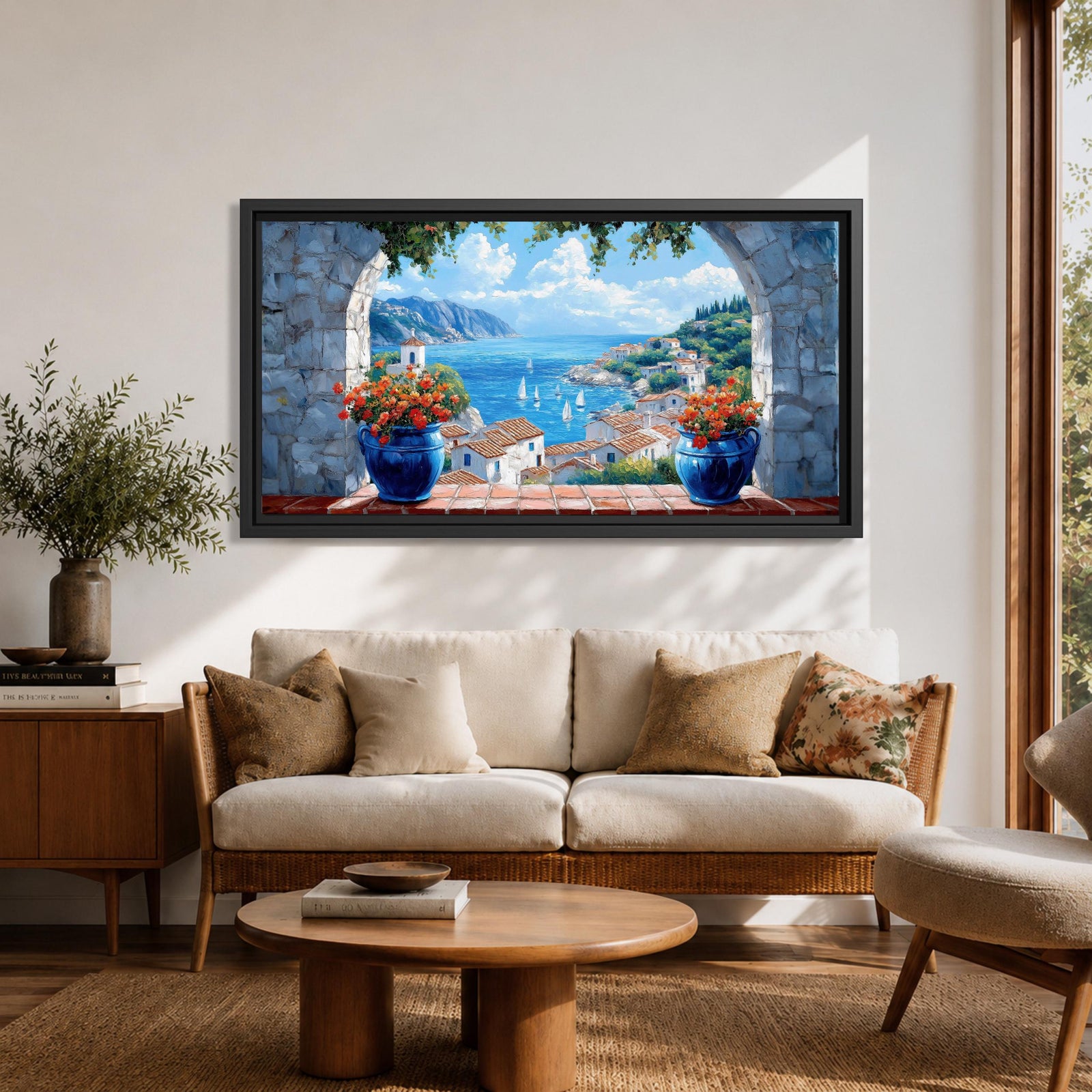 A panoramic painting of a Mediterranean seaside village viewed through a stone arch window, featuring blue ocean waters, sailboats, terracotta rooftops, and vibrant floral pots.