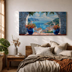 A panoramic painting of a Mediterranean seaside village viewed through a stone arch window, featuring blue ocean waters, sailboats, terracotta rooftops, and vibrant floral pots.
