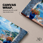 A panoramic painting of a Mediterranean seaside village viewed through a stone arch window, featuring blue ocean waters, sailboats, terracotta rooftops, and vibrant floral pots.