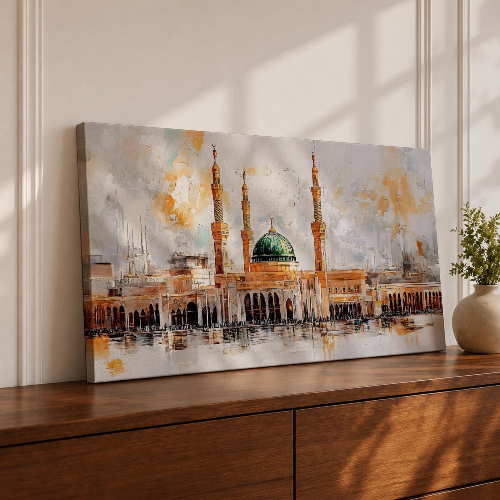 A panoramic painting of Masjid Al Nabawi featuring the iconic green dome and surrounding minarets, rendered in a textured impressionistic style with soft neutral tones and warm accents, capturing the architectural symmetry and reflective foreground across an expansive horizontal composition.