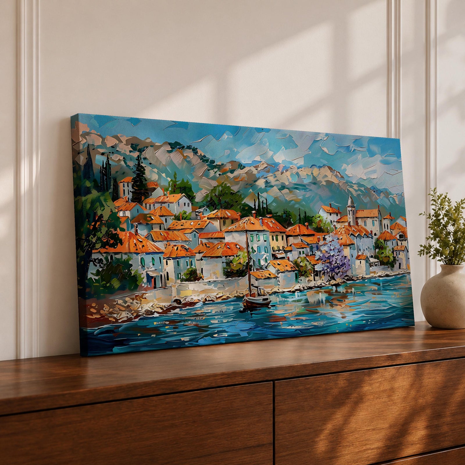 A panoramic painting of a Mediterranean coastal village with terracotta rooftops, colorful homes, and a calm harbor with a sailboat, set against mountains and a bright blue sky, rendered in a textured impressionistic style with vibrant colors.