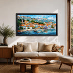 A panoramic painting of a Mediterranean coastal village with terracotta rooftops, colorful homes, and a calm harbor with a sailboat, set against mountains and a bright blue sky, rendered in a textured impressionistic style with vibrant colors.