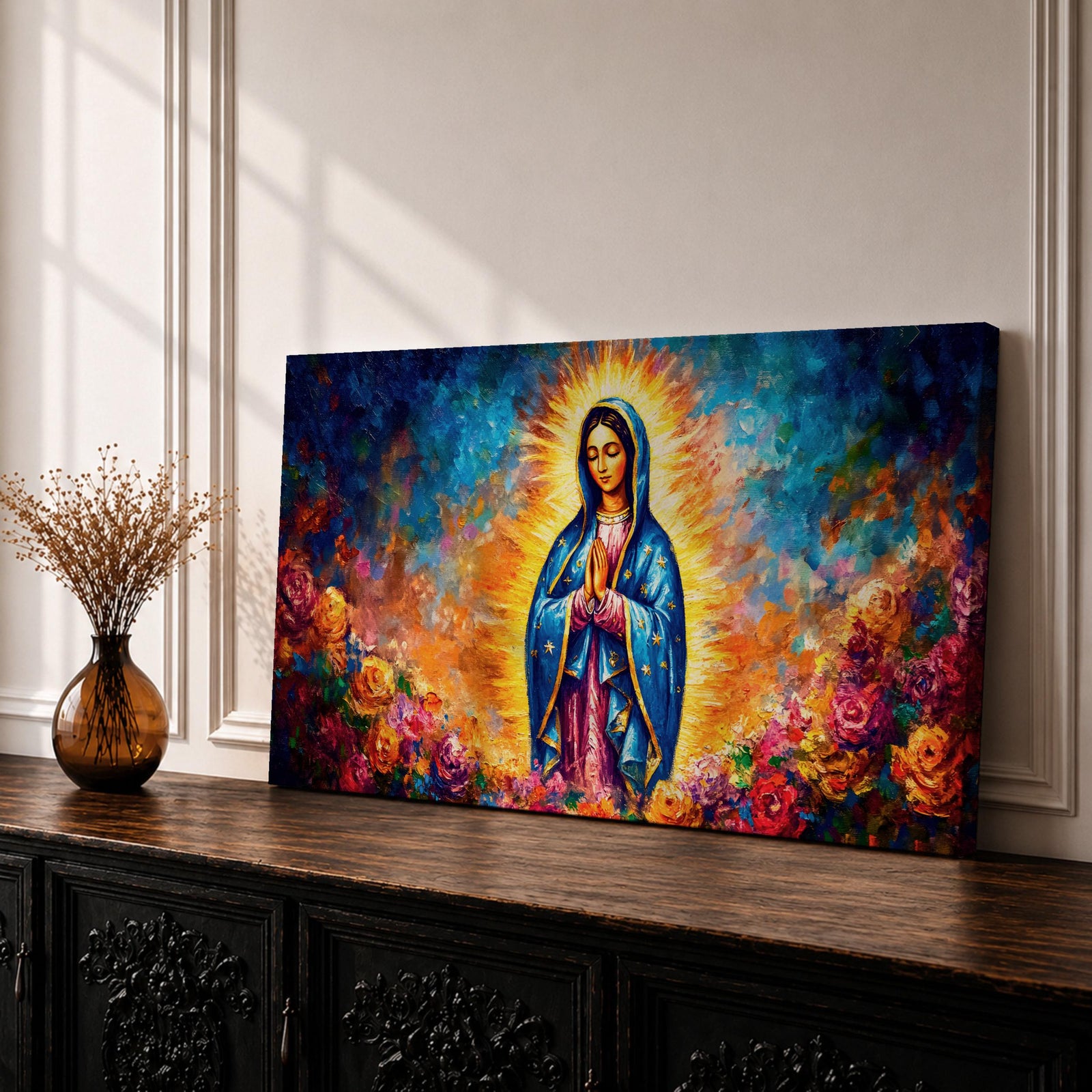 A panoramic devotional painting of Mary of Guadalupe standing in prayer with hands clasped, draped in a blue mantle with delicate star patterns and surrounded by a radiant golden aura, set against a richly textured background of deep blues, warm tones, and blooming roses that create a luminous and reverent composition.