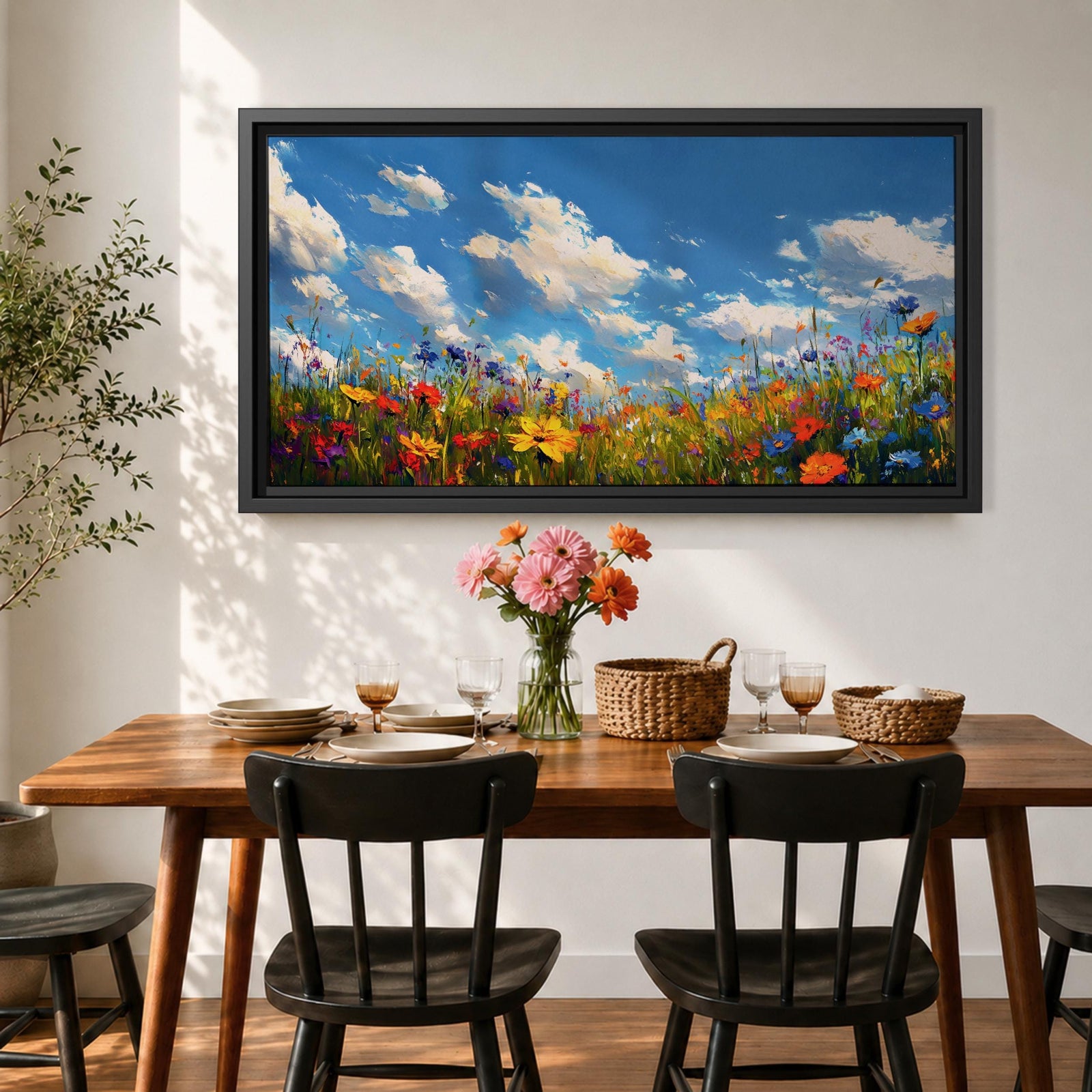 A panoramic painting of a colorful wildflower meadow under a bright blue sky with soft clouds, creating a vibrant and uplifting landscape scene.
