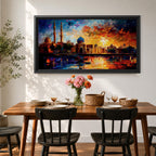 A vibrant panoramic painting of an Islamic city skyline with domes and minarets at sunset, reflecting in water below, rendered in bold expressive brushstrokes with rich orange, blue, and gold tones.