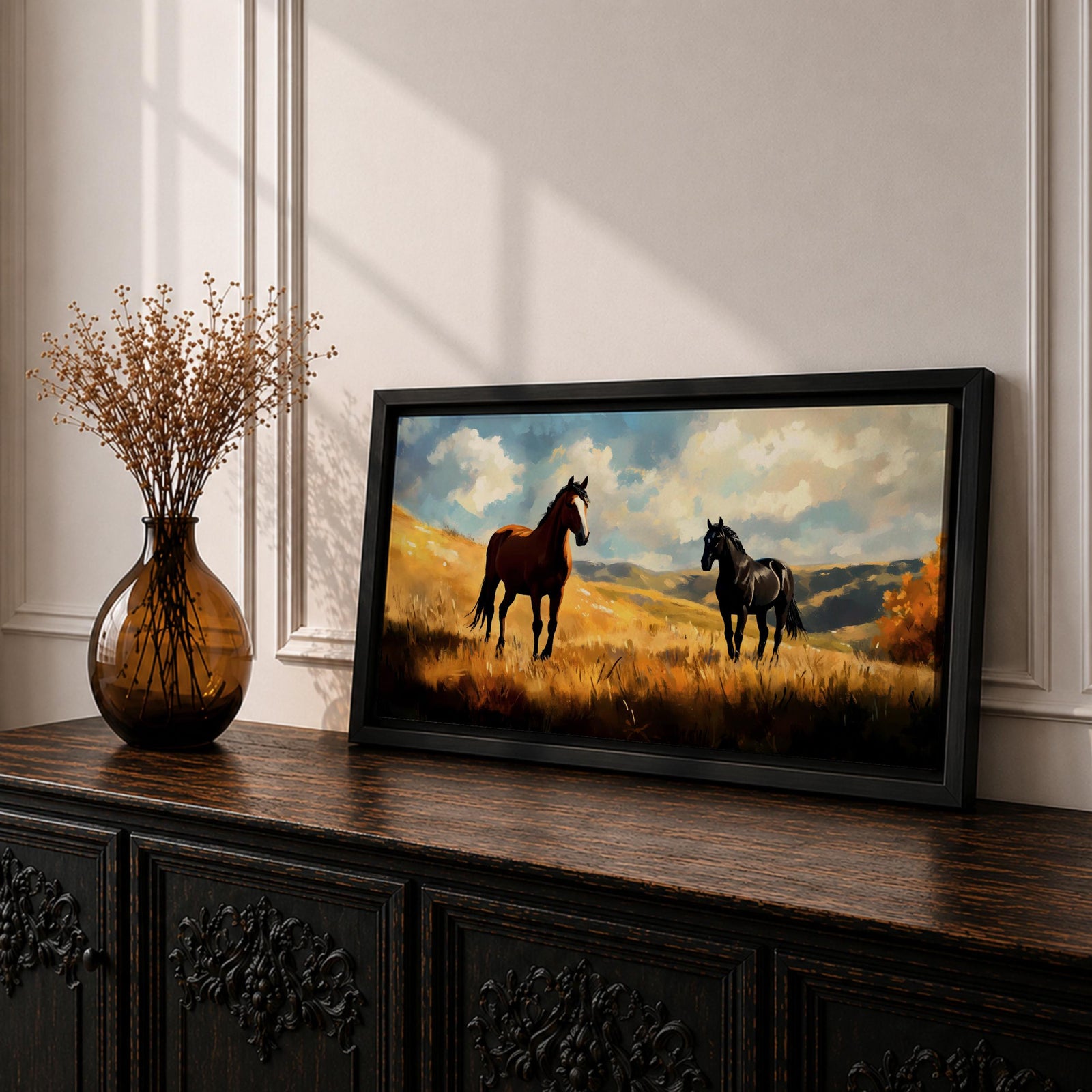 A panoramic painting of two wild horses standing in a sunlit open field, one chestnut and one black, surrounded by golden grasses and rolling hills beneath a dramatic sky filled with soft clouds, rendered in expressive brushstrokes that capture movement, light, and a natural untamed landscape.