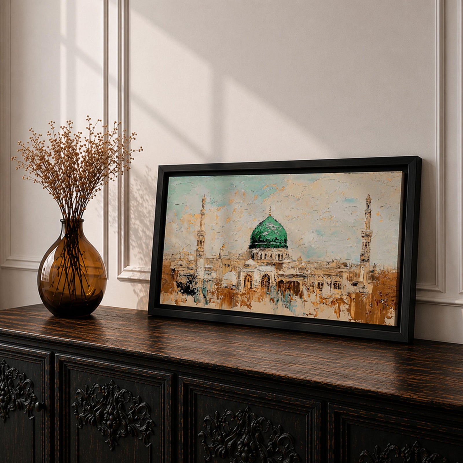 Panoramic abstract painting of Masjid Nabawi in Medina featuring the iconic green dome and two slender minarets rising above arches and mosque courtyards. The artwork uses thick textured brushstrokes in warm sand, gold, and cream tones with turquoise sky accents, highlighting the vibrant green dome in a wide horizontal composition.