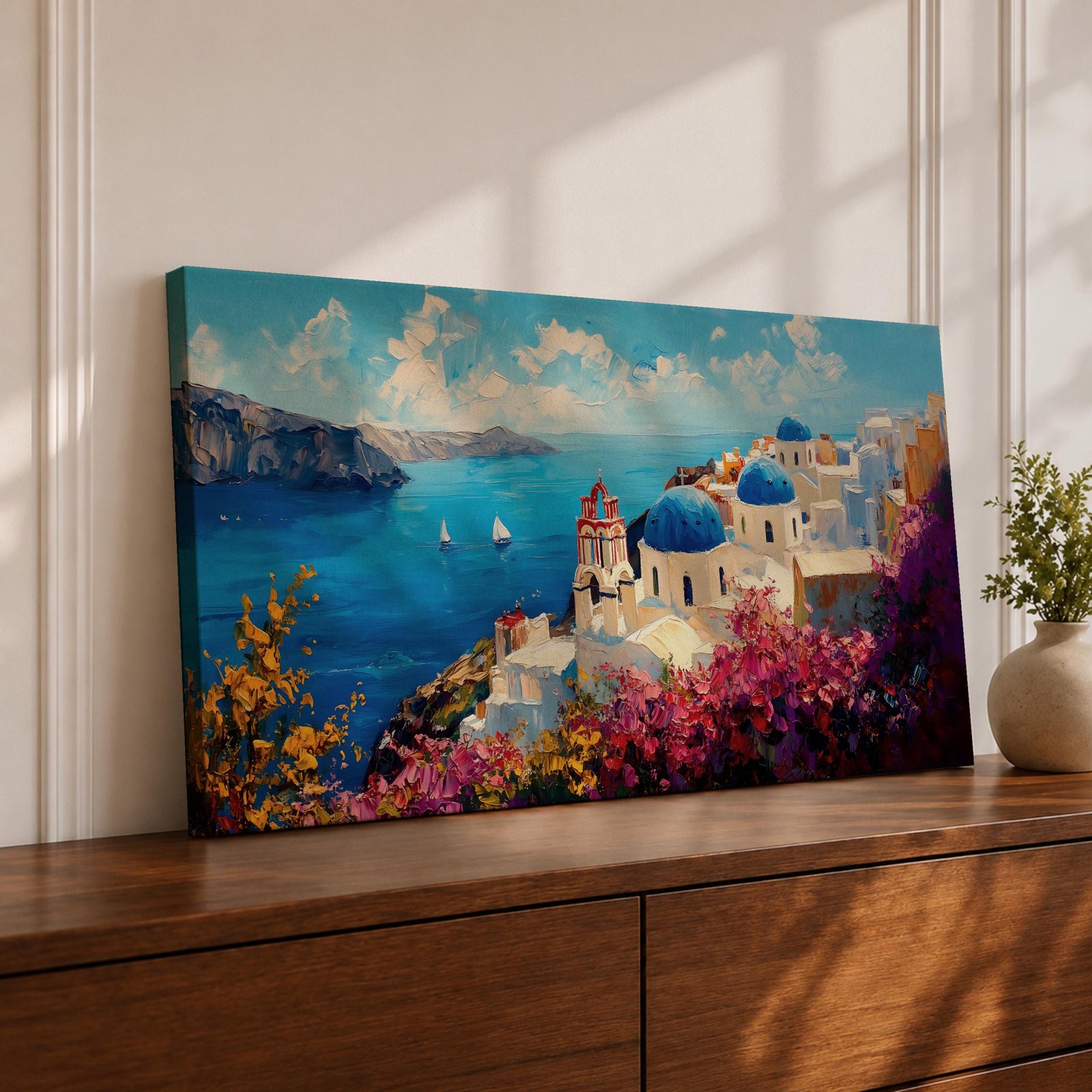 Panoramic impressionist painting of Santorini showing whitewashed cliffside buildings and blue domed churches overlooking the deep blue Aegean Sea. The scene includes sailboats on the water, rugged coastal cliffs in the distance, and vibrant bougainvillea flowers in the foreground painted with textured brushstrokes.