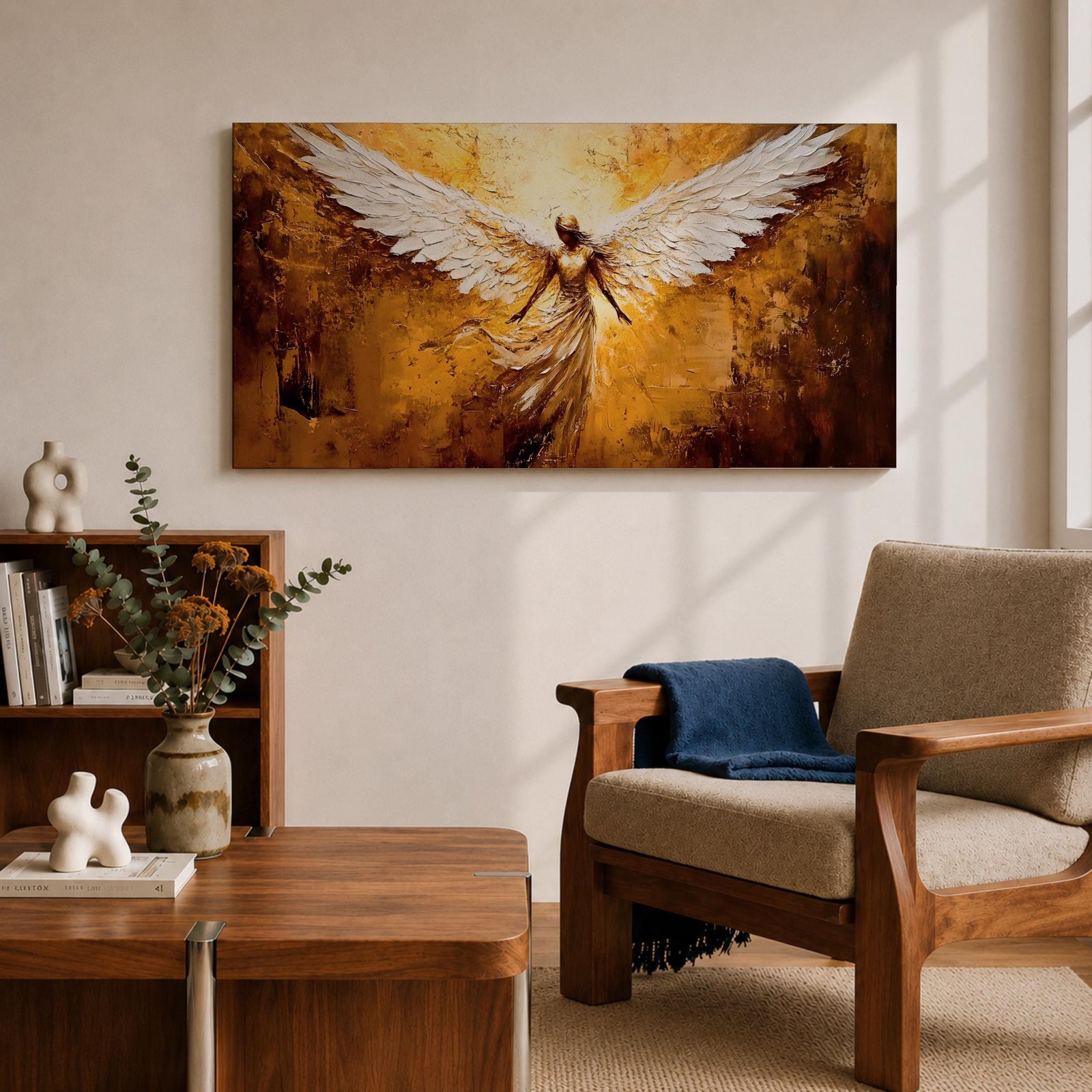 Panoramic painting of a luminous winged figure rising in radiant golden light with large white feathered wings spread wide. The composition uses thick textured brushstrokes in gold, amber, and bronze tones with flowing robes and glowing highlights that emphasize the dramatic celestial presence.