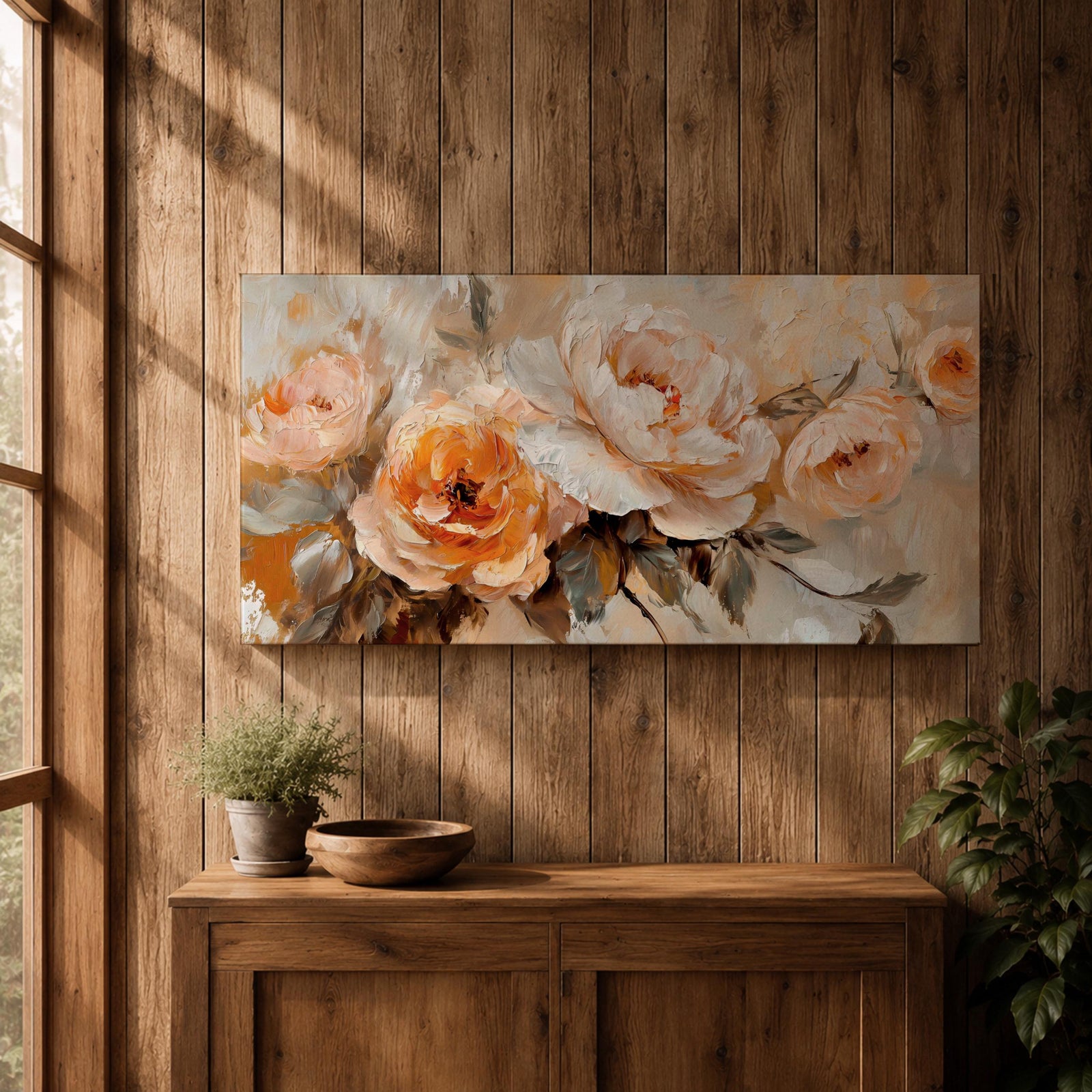 Panoramic floral painting featuring large peach and cream garden style blossoms with layered petals arranged in a soft bouquet composition. Thick textured brushstrokes in warm peach, ivory, and beige tones blend with muted green leaves and a light neutral background creating a wide botanical composition.