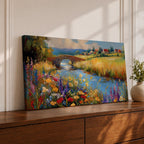 Panoramic landscape painting of a winding river flowing through a countryside meadow filled with colorful wildflowers. A small stone bridge arches over the water while fields, cottages, and rolling hills stretch into the distance under a bright sky, rendered with vibrant textured brushstrokes.
