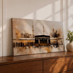 Panoramic painting of the Kaaba at Masjid al Haram in Mecca surrounded by mosque arches and tall minarets. The composition features the black cube structure at the center with pilgrims gathered in the courtyard, rendered in expressive brushstrokes with beige, brown, and gold tones.
