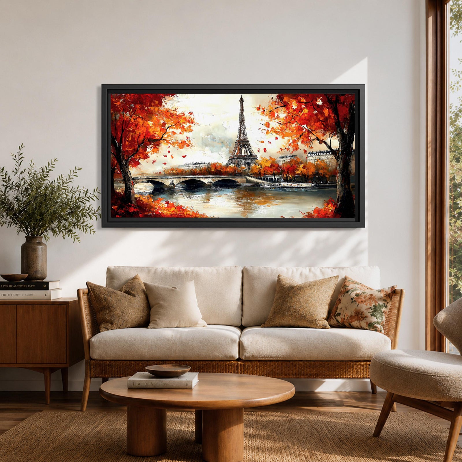 Panoramic painting of the Eiffel Tower rising above the Seine River with an arched stone bridge and classic Parisian buildings along the waterfront. Vibrant red and orange autumn trees frame the scene while textured brushstrokes reflect warm foliage and architecture across the calm river surface.