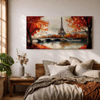 Panoramic painting of the Eiffel Tower rising above the Seine River with an arched stone bridge and classic Parisian buildings along the waterfront. Vibrant red and orange autumn trees frame the scene while textured brushstrokes reflect warm foliage and architecture across the calm river surface.