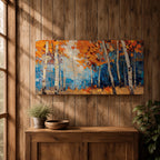 Panoramic painting of tall white birch trees with textured bark standing among vivid orange autumn foliage. Thick palette knife brushstrokes create layered leaves and forest floor tones, with warm golden light filtering through the canopy against cool blue woodland shadows.