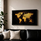 Panoramic artwork of a world map rendered in textured metallic gold against a deep black background. The continents appear with rough painterly edges and splattered gold accents, creating a bold global composition with strong contrast and modern map styling.