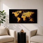 Panoramic artwork of a world map rendered in textured metallic gold against a deep black background. The continents appear with rough painterly edges and splattered gold accents, creating a bold global composition with strong contrast and modern map styling.