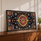 Panoramic decorative artwork inspired by Persian carpet design featuring a central floral medallion surrounded by intricate botanical motifs and symmetrical patterns. The composition includes red, gold, teal, and cream tones arranged across a dark background with ornate borders and repeating floral elements.