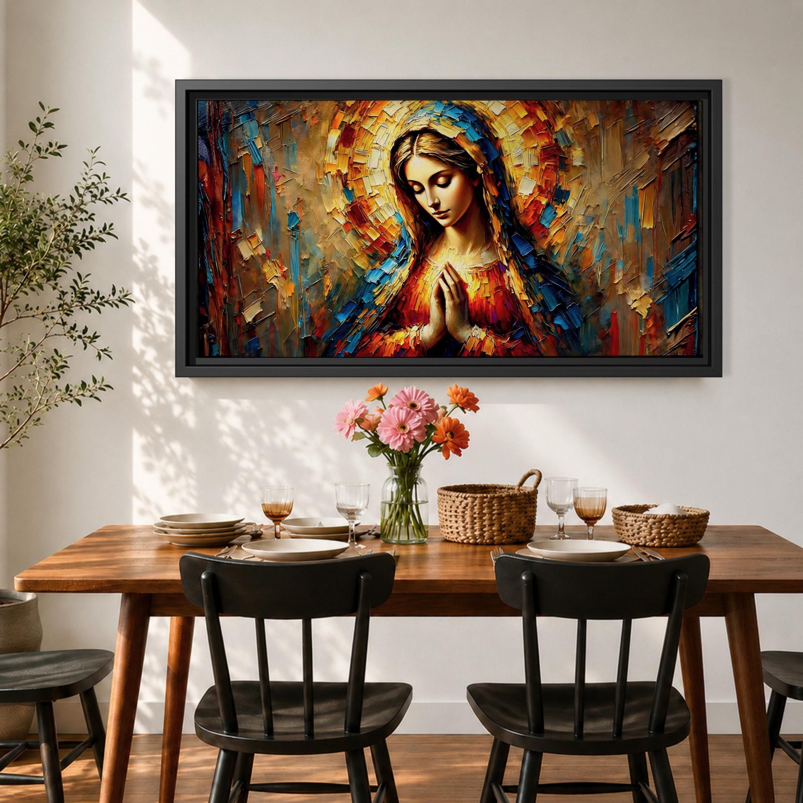 Panoramic textured painting of the Virgin Mary with hands clasped in prayer and a radiant halo behind her head. The composition features expressive palette knife strokes in gold, blue, red, and warm earth tones forming a luminous devotional portrait.