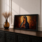 Panoramic religious painting of the Virgin Mary praying with hands together and head bowed, surrounded by a radiant golden halo against a warm dark background.