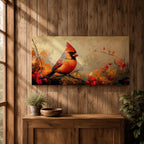 Panoramic painting of a bright red cardinal perched on a thin branch surrounded by warm autumn foliage with textured painterly brushstrokes and glowing seasonal tones.
