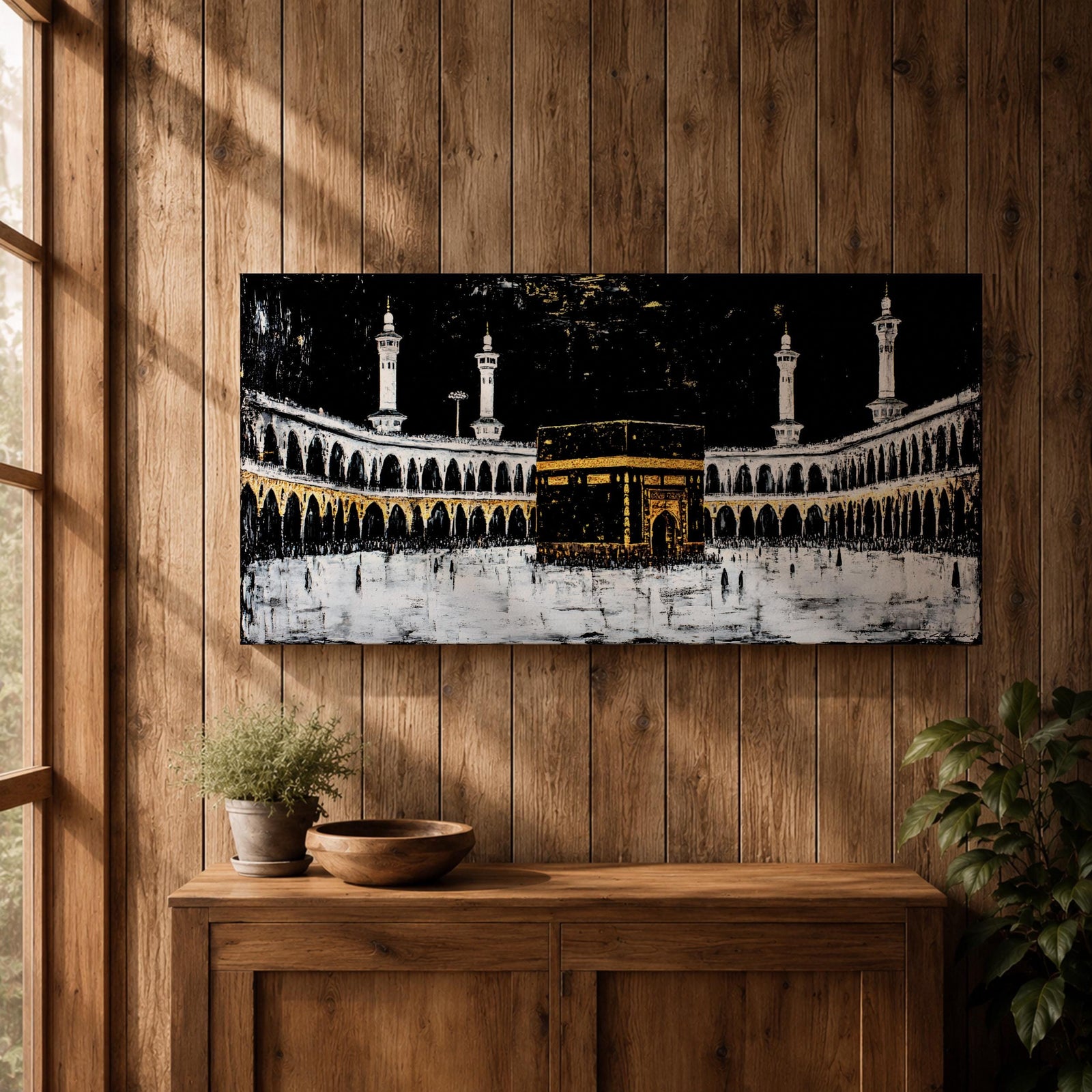 Panoramic artwork of the Kaaba at Masjid al-Haram in Mecca with black and gold accents surrounded by mosque arches and tall minarets against a dark night background.