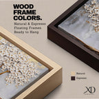 Panoramic artwork of a white blossoming tree with a flowing golden trunk and roots spreading across a textured gray background symbolizing the tree of life.
