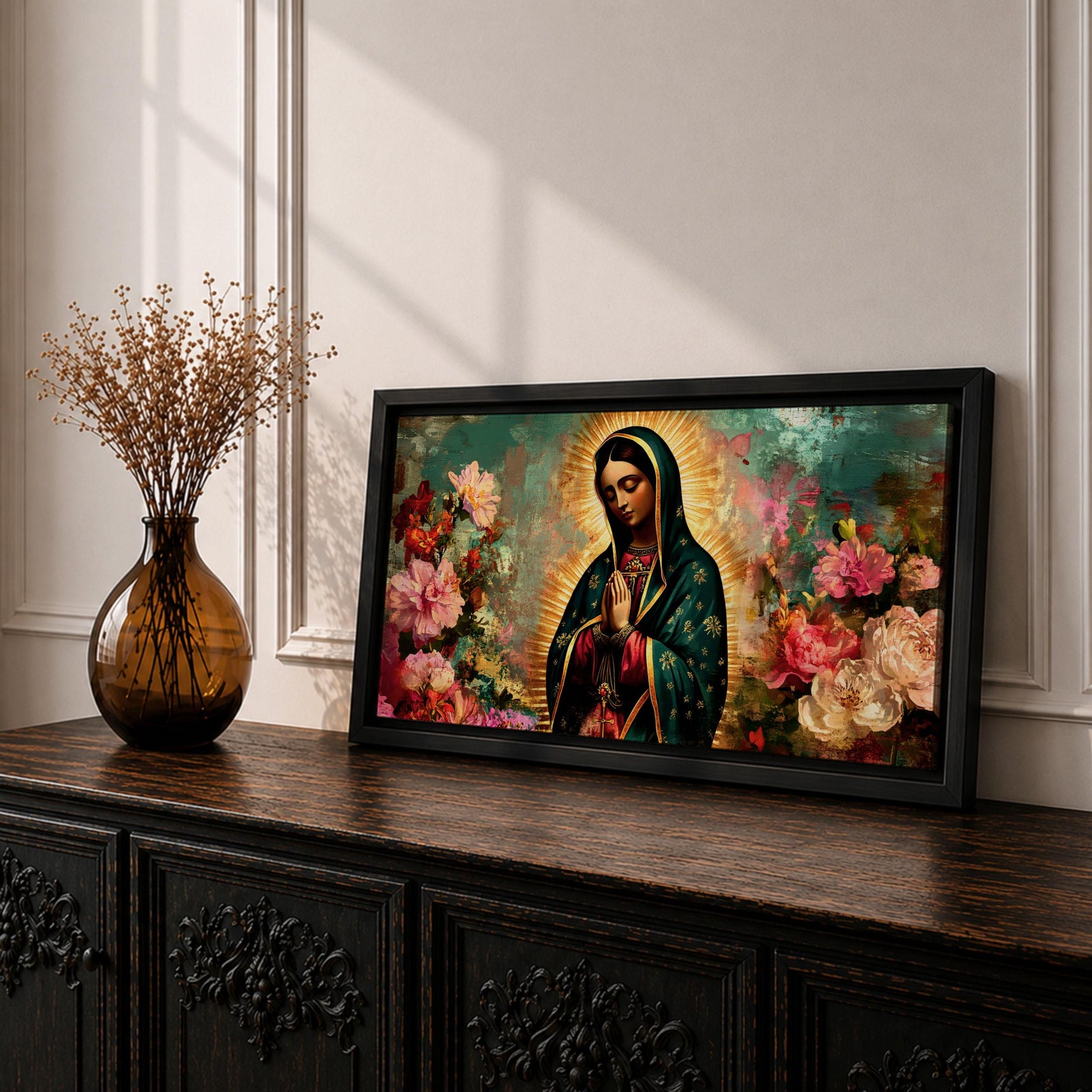 Panoramic painting of the Virgin Mary with hands in prayer surrounded by colorful flowers and a radiant golden halo in a devotional Catholic composition.