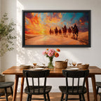 Panoramic painting of a camel caravan traveling across golden desert dunes at sunset with riders silhouetted beneath a vibrant dramatic sky.
