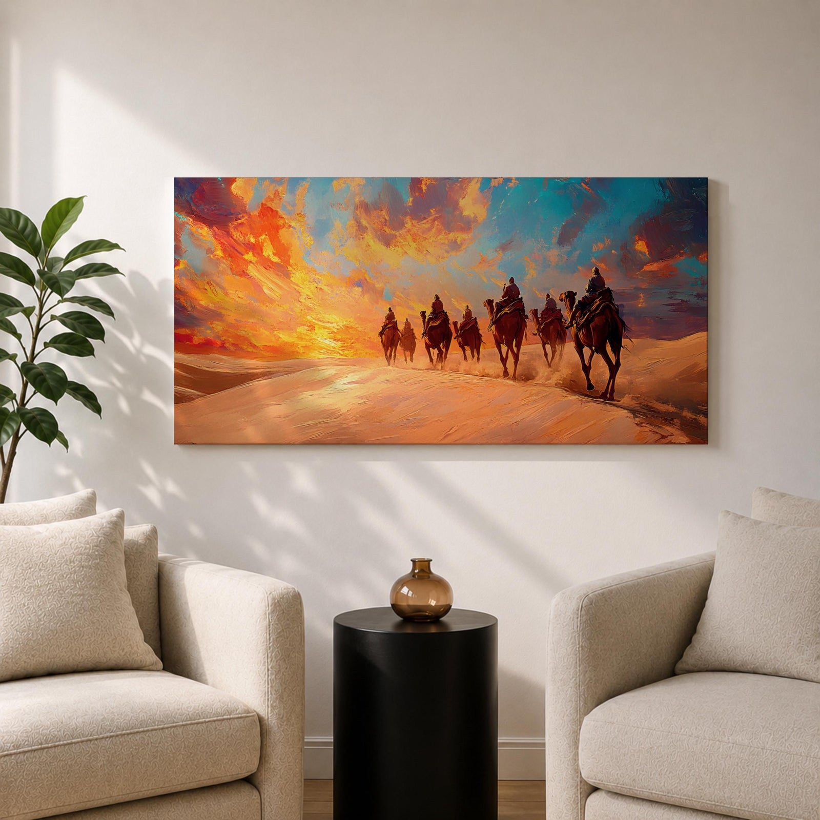 Panoramic painting of a camel caravan traveling across golden desert dunes at sunset with riders silhouetted beneath a vibrant dramatic sky.