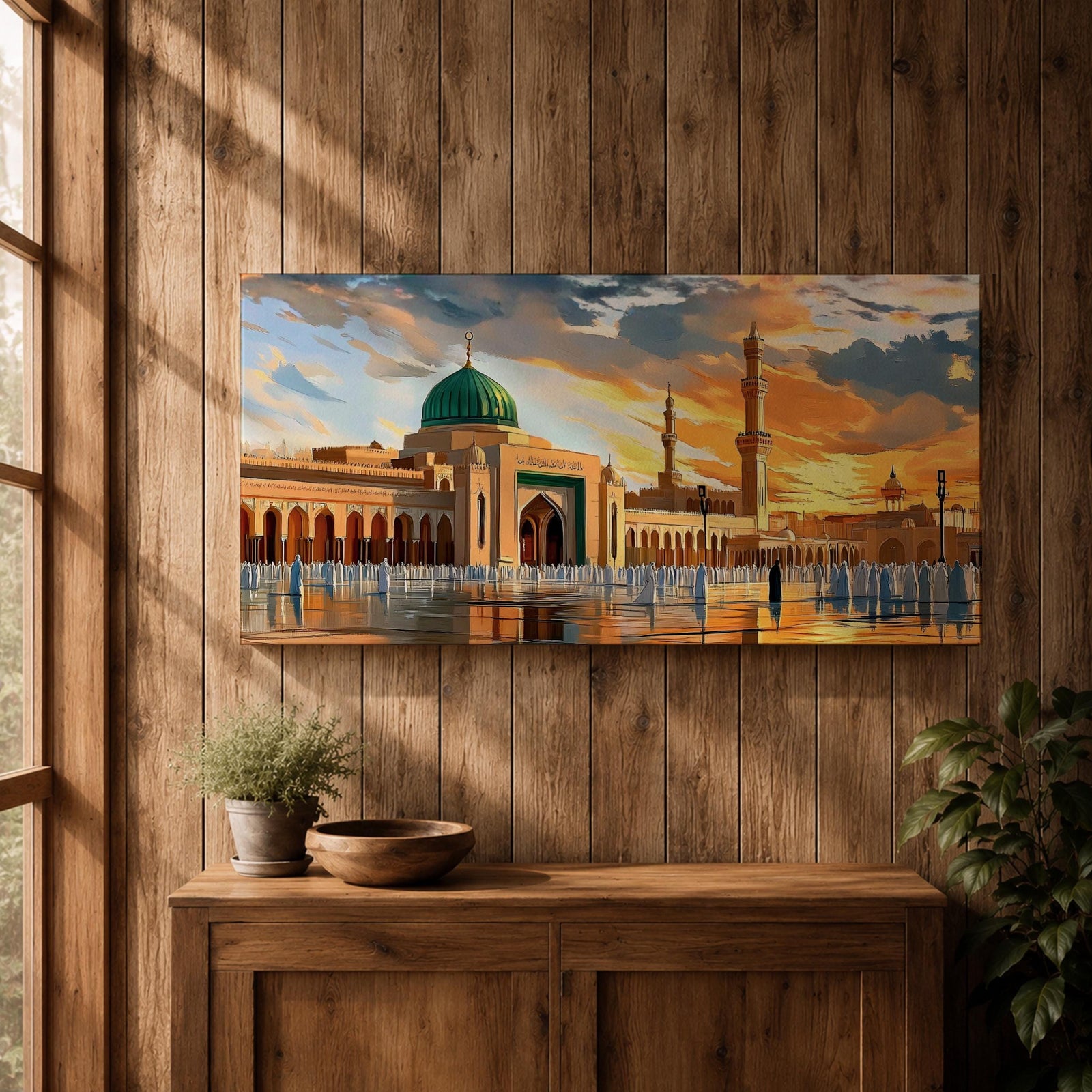 Panoramic painting of Al Masjid an Nabawi in Medina featuring the iconic green dome rising above the mosque courtyard with surrounding arcades and tall minarets. Pilgrims gather across the reflective marble plaza while dramatic sunset clouds illuminate the historic Islamic architecture.