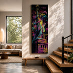 A tall narrow artwork of the Statue of Liberty rendered in vibrant graffiti style with bold neon colors, layered spray paint textures and street tags across the background, featuring dynamic splashes of pink, yellow, blue and green with high contrast outlines in an urban pop art composition.