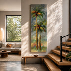 A tall narrow painting of two palm trees with slender trunks and lush green fronds, rendered in expressive brushstrokes with layered tones of green, gold, and soft red against a muted abstract background of blue and gray, creating a loose impressionistic tropical landscape composition.