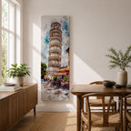 Long vertical watercolor style painting of the Leaning Tower rising above a lively Italian piazza with outdoor café tables and people walking along a stone street. The famous marble tower tilts gently against a bright sky while expressive brushstrokes capture the atmosphere of a historic Italian landmark and travel scene.
