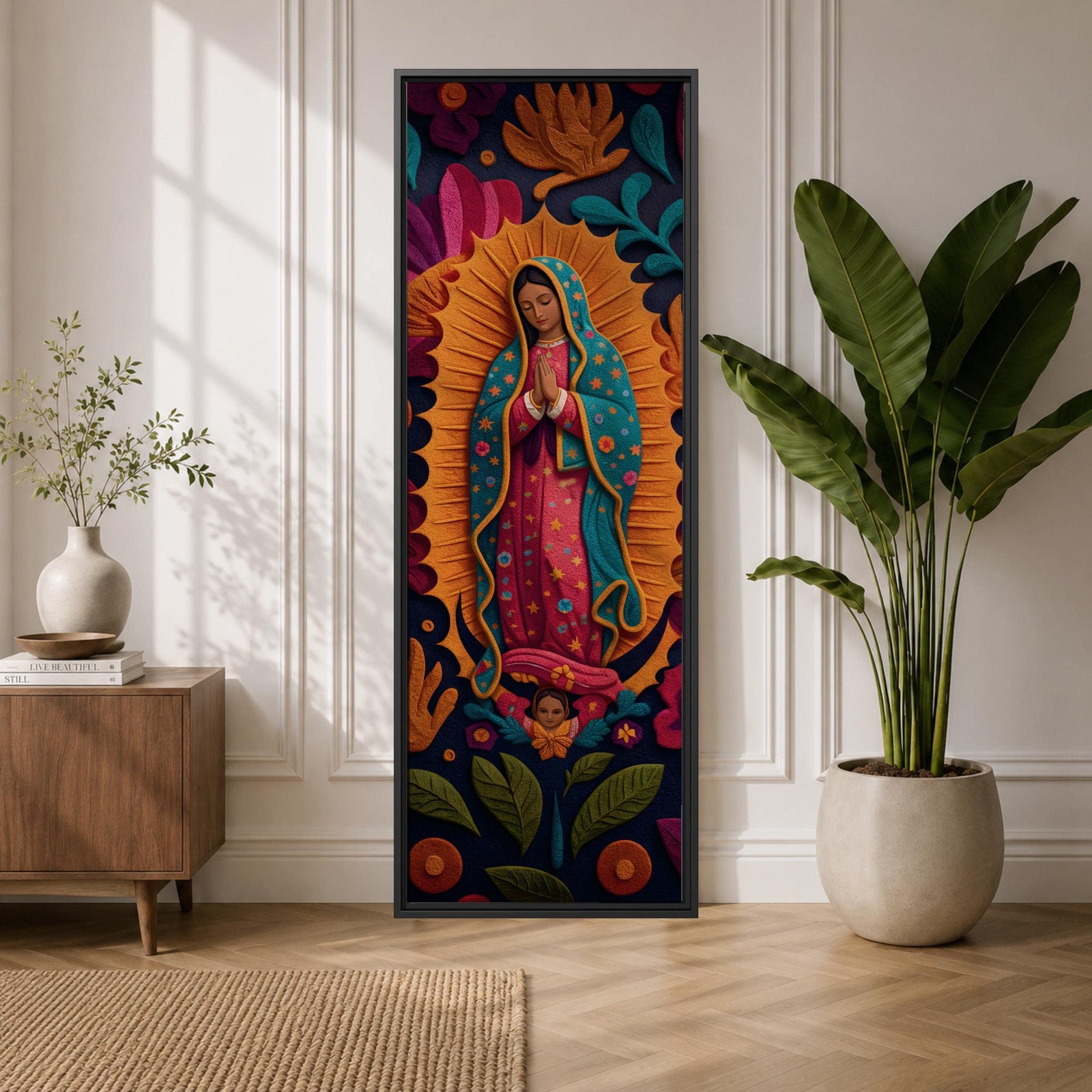 A tall narrow vertical depiction of Our Lady of Guadalupe with hands clasped in prayer, wearing a star covered mantle and framed by a radiant sunburst, surrounded by layered floral and botanical forms in a Mexican folk art style with rich contrasting tones and a dimensional textured composition.