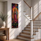 A tall narrow vertical depiction of Our Lady of Guadalupe with hands clasped in prayer, wearing a star covered mantle and framed by a radiant sunburst, surrounded by layered floral and botanical forms in a Mexican folk art style with rich contrasting tones and a dimensional textured composition.