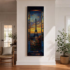 Long vertical painting of the Eiffel Tower seen through an open window with balcony railings and flowers in the foreground. A dramatic sunset sky glows with orange and blue tones above the Paris skyline while expressive brushstrokes create a romantic cityscape composition.