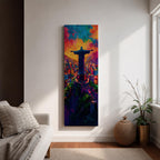 A tall vertical painting depicts Christ the Redeemer with arms outstretched overlooking a vibrant cityscape, rendered in bold expressive colors of orange, blue, pink, and purple, with textured brushstrokes and a glowing sky above, capturing a dynamic modern interpretation of the iconic statue set against a lively urban landscape.