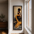 A tall narrow vertical depiction of a Black mermaid with a natural afro hairstyle seated on rocky shoreline, her shimmering gold tail cascading downward into the water, rendered with textured tile like detail and warm light reflecting across her form, creating a bold composition with contrast, depth, and coastal atmosphere.