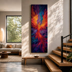 A tall vertical painting depicts a vibrant phoenix with wings fully extended, rendered in bold flowing strokes of fiery orange, red, and gold blending into deep purples and blues, its elongated tail cascading downward in fluid motion, creating a dynamic abstract firebird rising with intense color contrast and expressive texture.