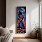 A tall vertical artwork shows an astronaut in a detailed space suit playing an electric guitar, set against a vivid cosmic backdrop with a glowing moon, deep blue sky, and splashes of neon pink, green, and orange paint, while bright flowers bloom at the base, blending surreal space imagery with street art style and bold expressive color.