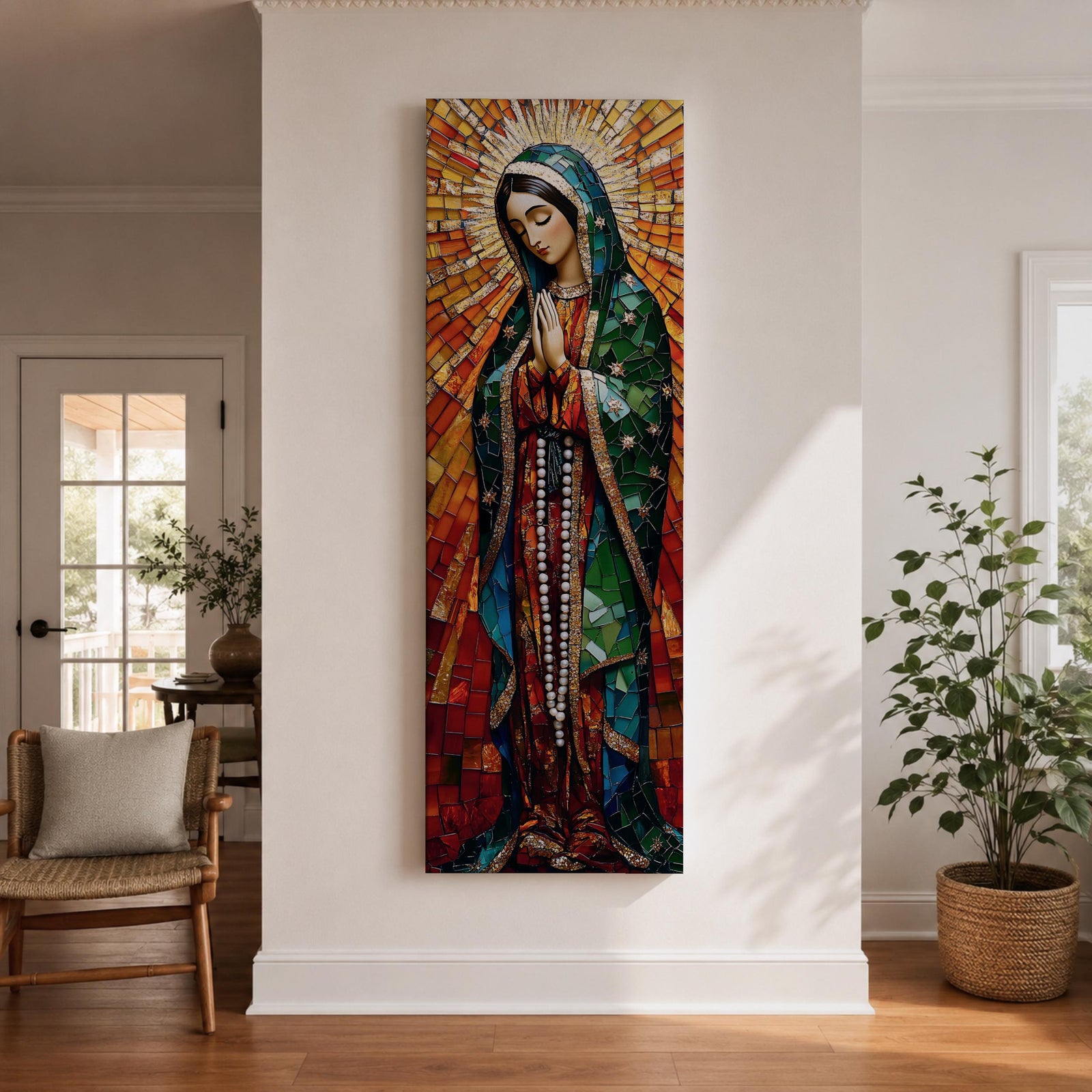 Long vertical stained glass style depiction of Our Lady of Guadalupe with hands clasped in prayer. She wears a green mantle decorated with stars and a red robe while radiant golden rays form a halo behind her, composed of colorful mosaic glass pieces forming a luminous devotional image.