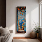 Tall vertical Mediterranean coastal painting showing a view through open blue wooden shutters toward the Amalfi Coast sea. Orange branches hang above a sunlit window frame overlooking colorful seaside houses, small boats, and a sailboat on deep blue water with distant coastal hills rendered in textured oil brushstrokes.