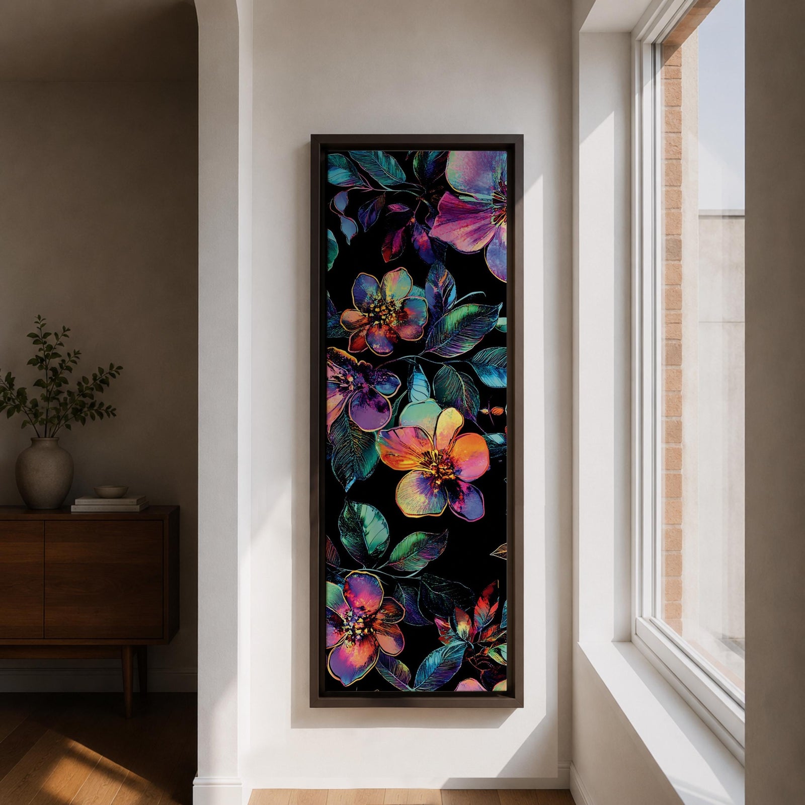Tall vertical botanical artwork featuring glowing neon flowers in vibrant rainbow colors against a deep black background. Large luminous blossoms in pink, orange, purple, and blue are surrounded by detailed leaves, creating a modern floral composition with bold contrast and iridescent color transitions.
