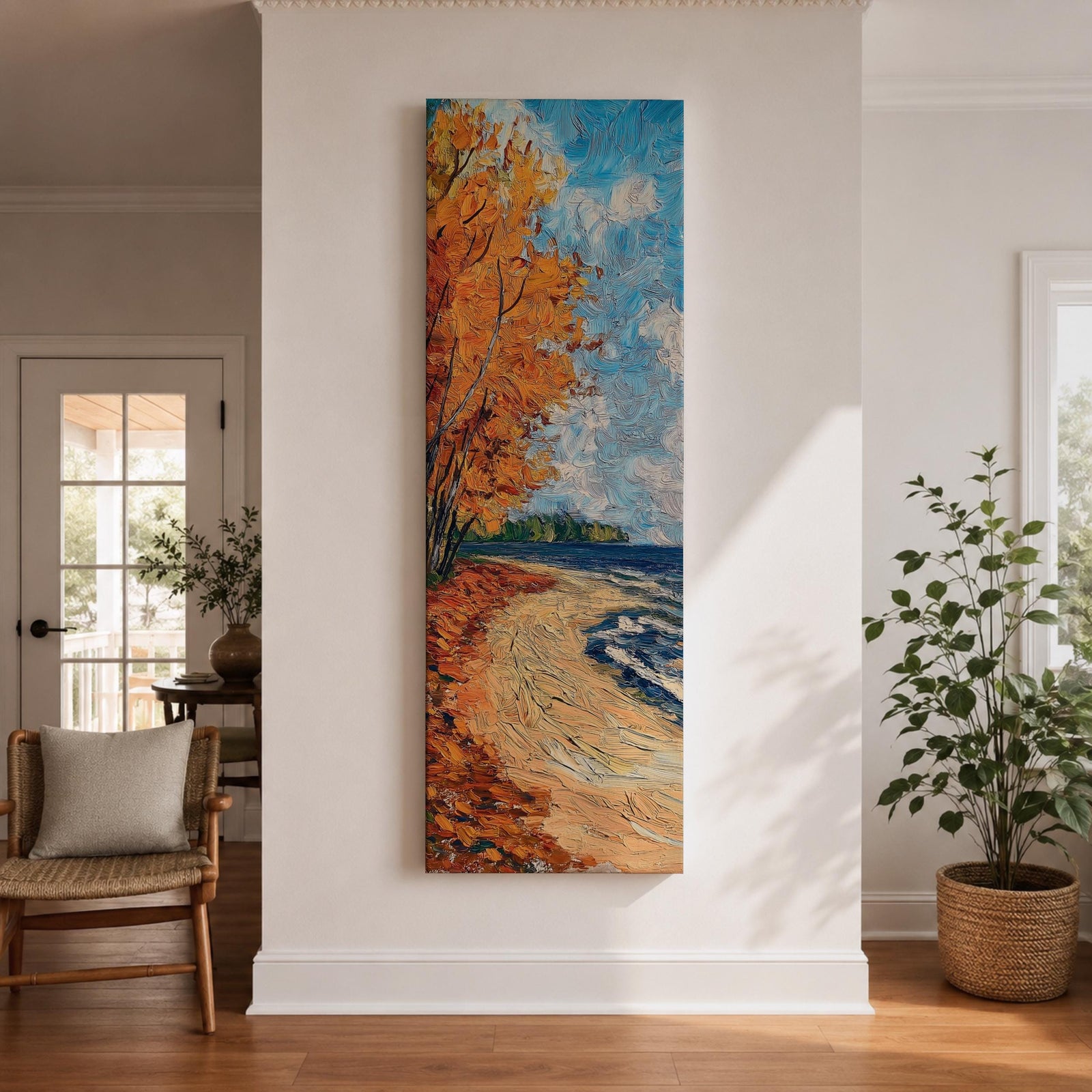 Tall vertical landscape painting of an autumn shoreline with golden orange trees lining a sandy beach beside deep blue water. Thick palette knife brushstrokes create textured waves, falling leaves, and swirling sky patterns while the curved shoreline leads toward a distant forest horizon.