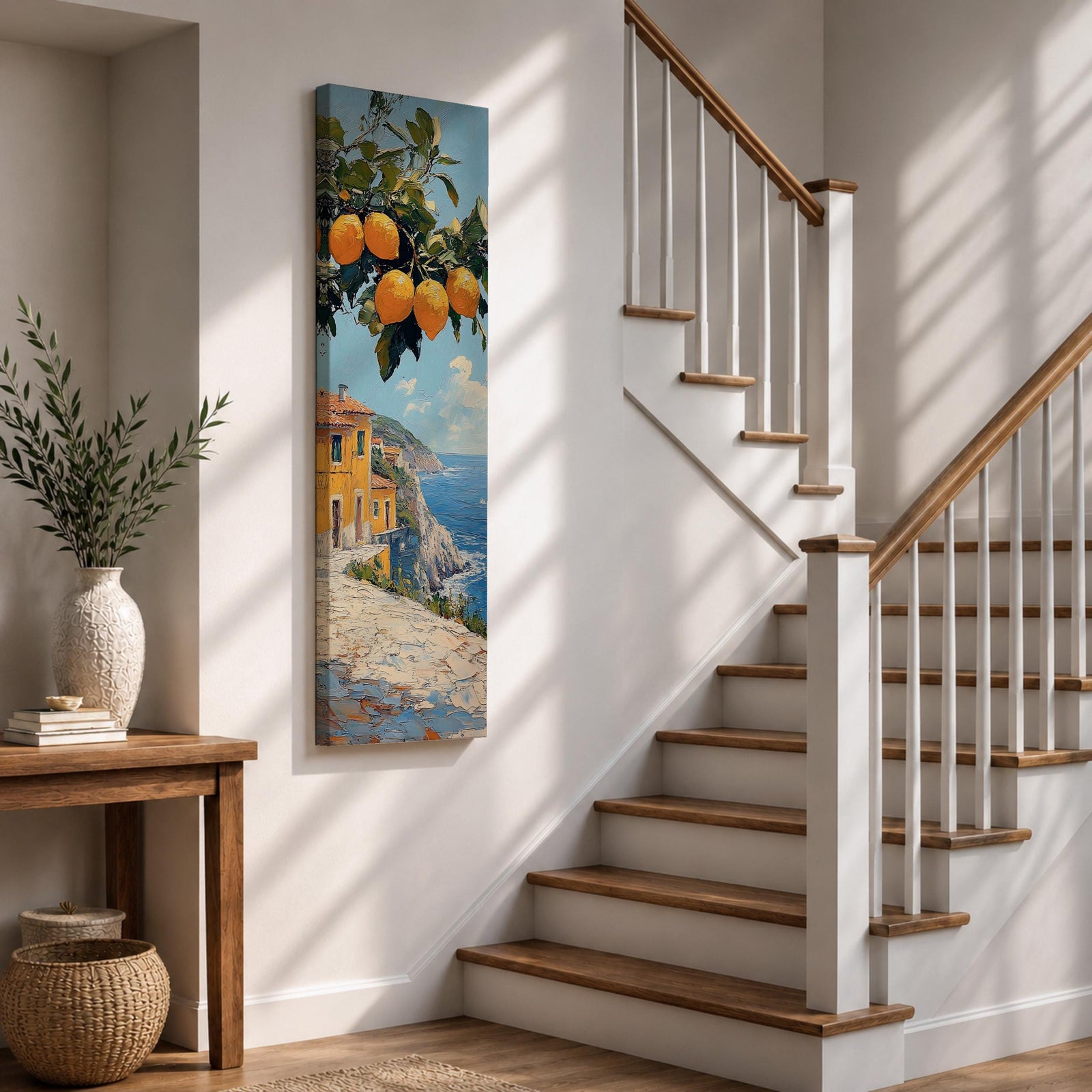 Tall vertical Mediterranean coastal painting showing bright yellow lemons hanging from a leafy branch above an Amalfi seaside village. Colorful Italian buildings sit along a cliffside path overlooking deep blue ocean waters beneath a sunny sky.