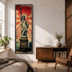 Long vertical retro poster style artwork featuring the Statue of Liberty standing on her pedestal holding the torch high with a tablet in her arm. Bold red sunburst rays radiate behind the monument while distressed textures and muted green tones create a vintage propaganda inspired illustration of the iconic New York landmark.