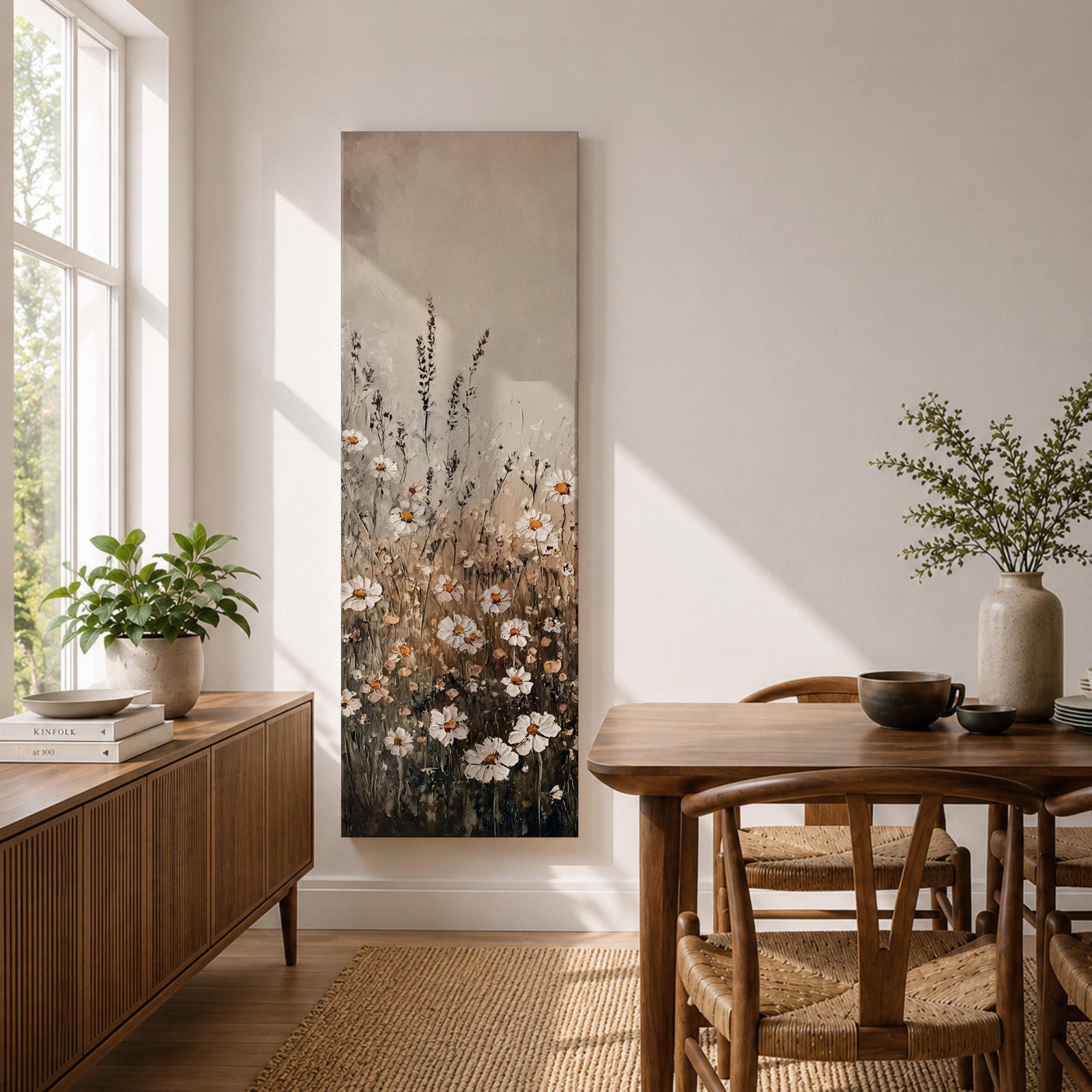 Long vertical painting of delicate wildflowers and daisies rising through tall meadow grasses in soft neutral tones. White petals with warm golden centers appear among slender stems and subtle foliage against a muted beige sky creating a calm botanical meadow composition with layered natural textures.