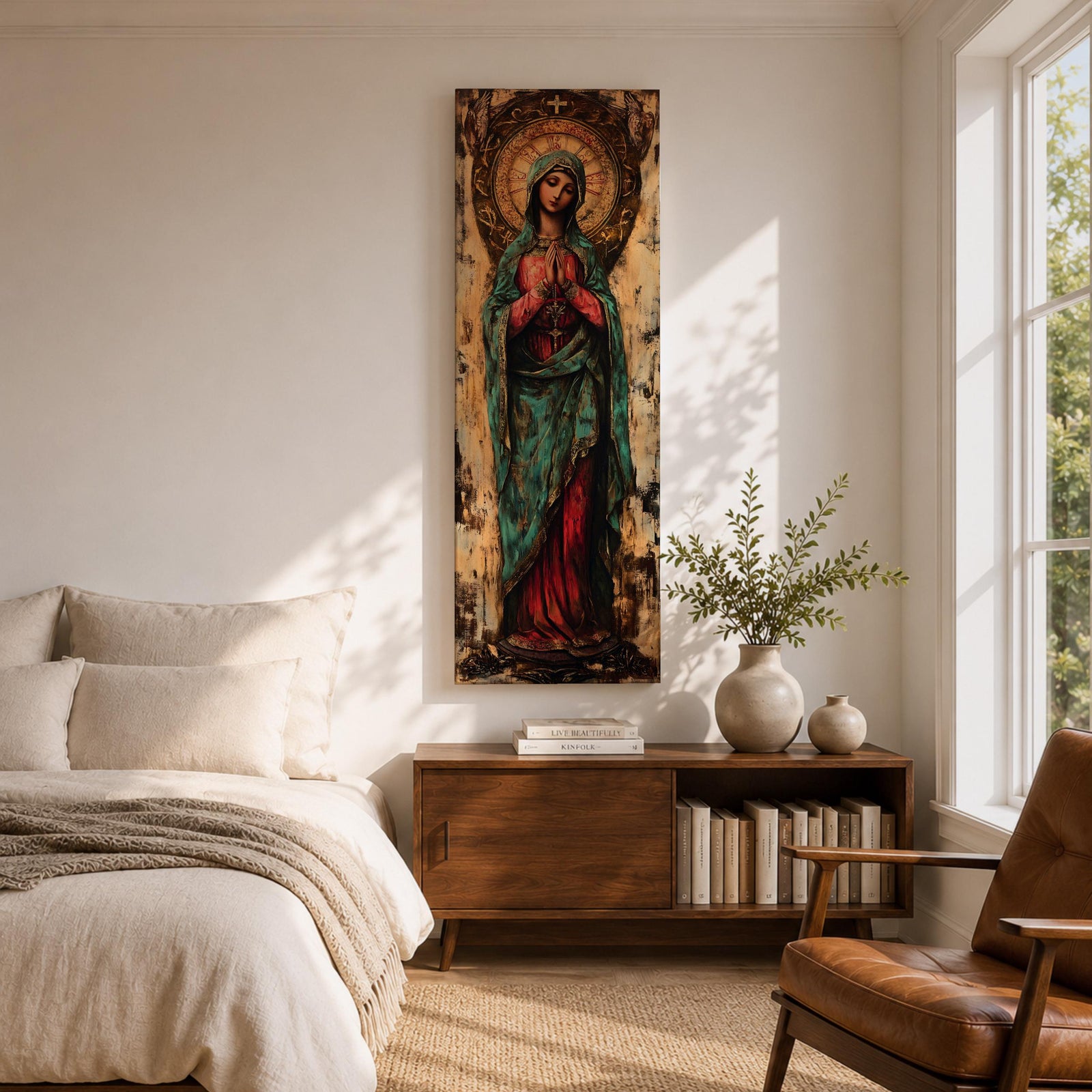 Long vertical painting of the Virgin Mary standing with hands clasped in prayer, wearing a deep red robe and teal mantle. An ornate circular golden halo with sacred symbols forms a radiant backdrop while textured brushwork and aged tones create a traditional Catholic devotional icon style composition.