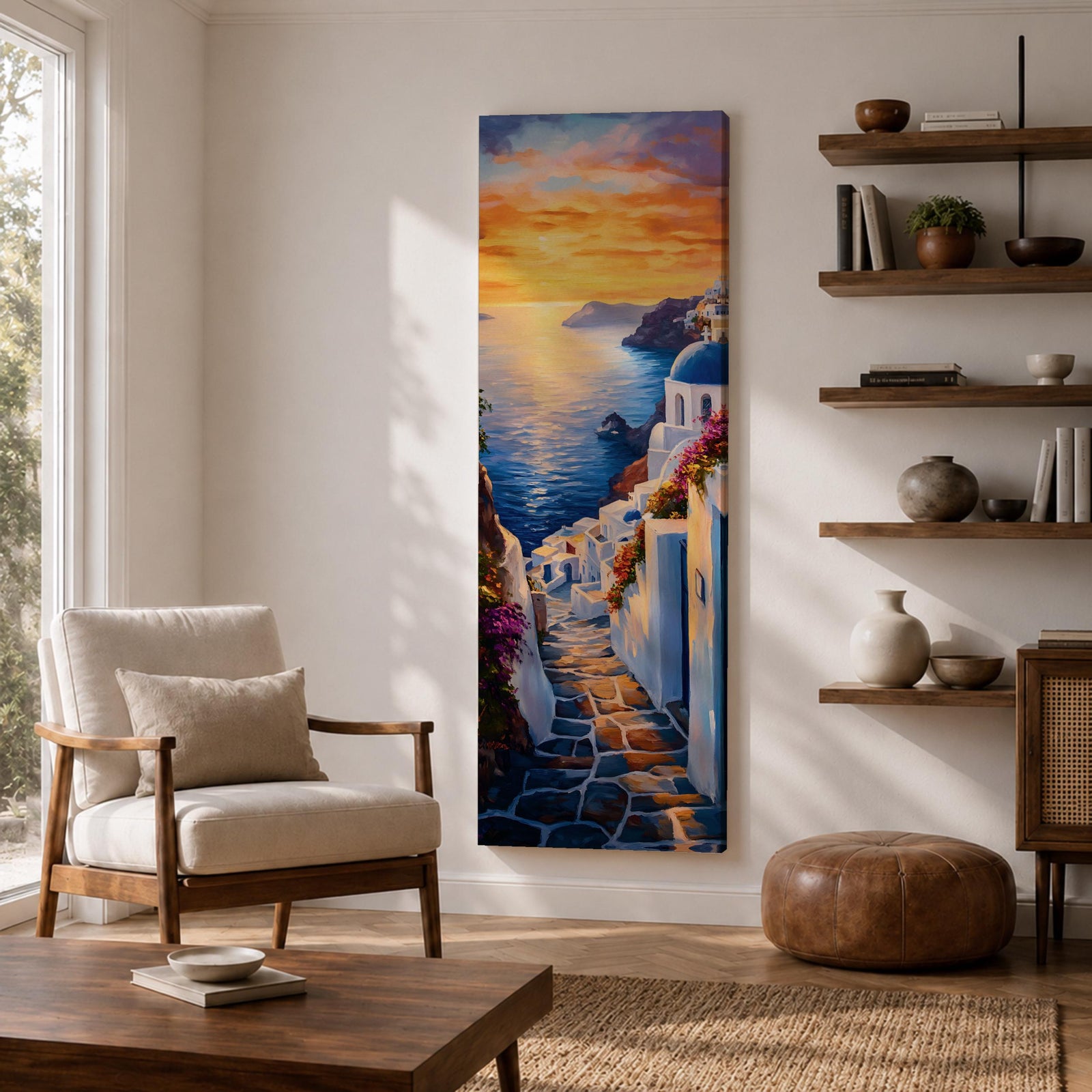 Long vertical painting of a Santorini coastal village with whitewashed buildings and a blue dome church overlooking the sea at sunset. A stone pathway descends between bright white walls toward the shoreline while golden sunlight reflects across calm water and warm clouds fill the sky.